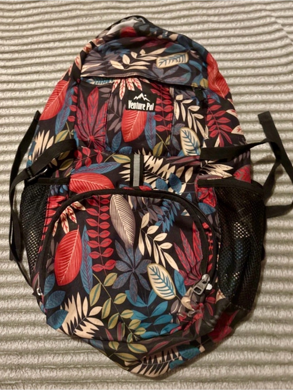Venture Pal Women's Floral Leaf Backpack in Black with Red & Blue Leaves